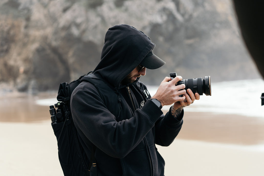Patrick Putzker filming outdoors with a camera, Chiang Mai